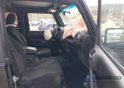 2014 Jeep Wrangler Willys Wheeler z USA, uszkodzony, nr VIN 1C4AJWAG9EL327728